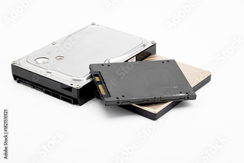 Hard disk and ssd disk (solid state drive) on white background , size comparison of hard disk