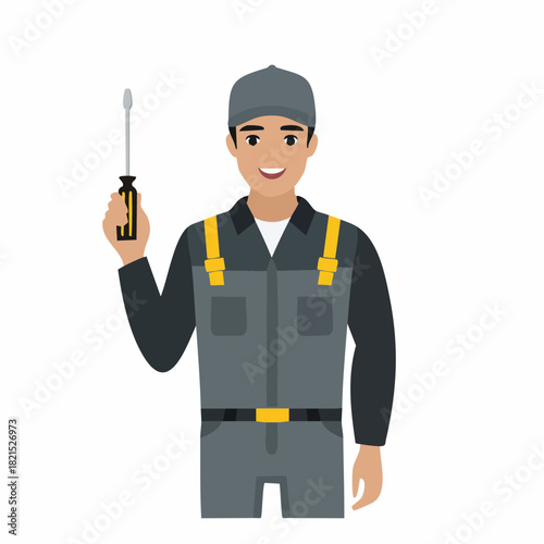 Smiling handyman holding screwdriver in workshop ready to fix equipment with confidence and a positive attitude.