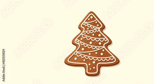 Festive gingerbread cookie shaped like a Christmas tree and decorated with white icing on a light cream-colored background.