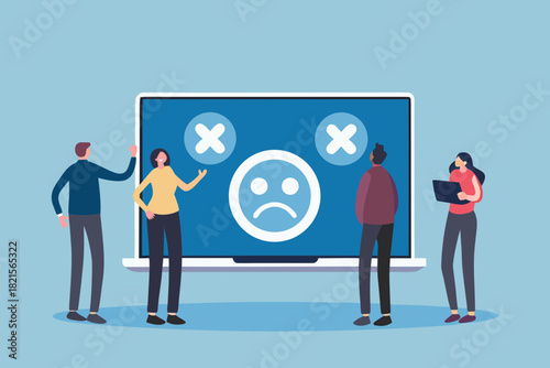 Diverse team members react to negative feedback and a sad face on a large computer screen
