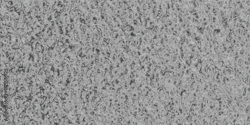 Close-up macro view of a speckled granite texture with a mottled pattern of dark and light grey flecks, offering a sophisticated and durable background for design projects