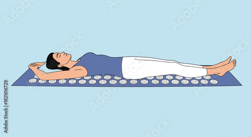 Woman lying on a blue acupressure mat with her arms behind her head.