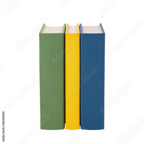 Five Colorful Hardcover Books Lined up on a Shelf in a Neat Arrangement