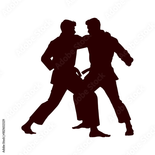 Silhouette of two martial artists sparring in a fighting stance