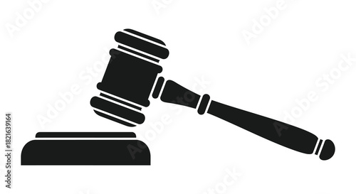 A black silhouette of a gavel and sounding block legal justice symbol silhouette
