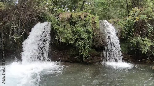 Dual Waterfalls Amidst Lush Greenery in Fiumefreddo Bruzio, Italy