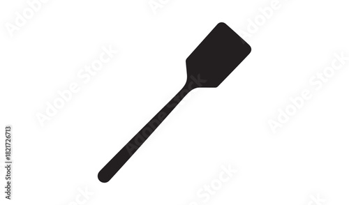 Black silhouette of a kitchen spatula on a white background