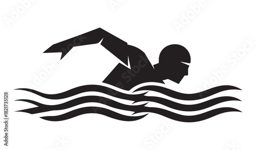 Silhouette of a swimmer performing freestyle stroke in wavy water