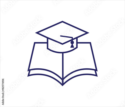  graduation hat with a tassel on an open text book representing knowledge and academic success