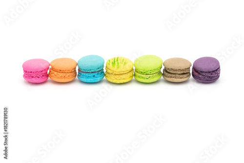 Colorful mini macaroons isolated on white background