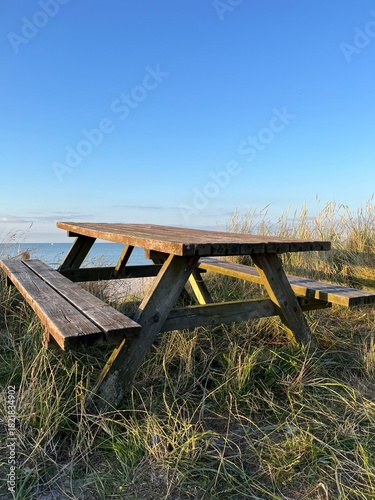 wooden bench on the beach