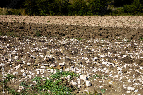 Various colored streaks in the strips of different plowed terrains, Roccaraso, Abruzzo, Italy