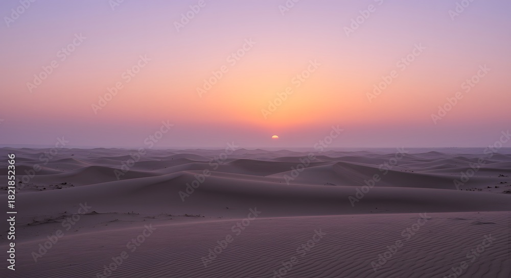 Obraz premium The soft, pastel colors of dawn over the desert.