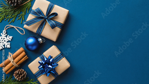 Festive christmas gifts and decorations on a deep blue background