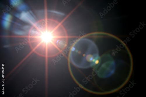 Wallpaper Mural Bright lens flare with orange starburst and circular rainbow effect Torontodigital.ca