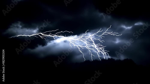 Bright flashes of lightning electrify the dark sky as a thunderstorm rages, showcasing nature's raw power and beauty at night