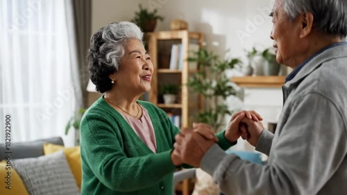 Wallpaper Mural Joyful senior couple dancing together at home

 Torontodigital.ca