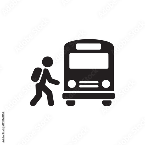 Silhouette of a student with a backpack walking towards a school bus for transportation