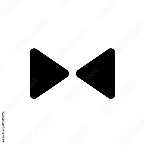 Twin backward triangles representing rewind control, media navigation and digital playback direction