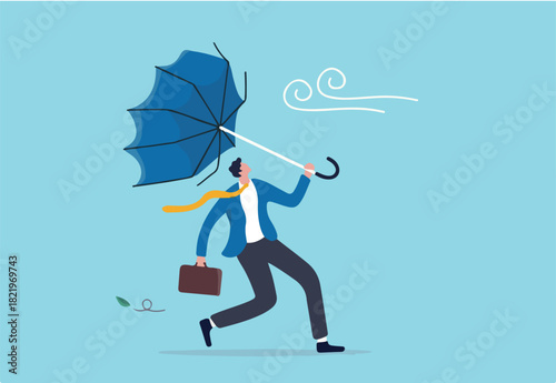 Business difficulty or obstacle in economic crisis, mistake or accident causing problem or failure, depressed and anxiety concept, frustrated businessman holding broken umbrella in strong wind storm