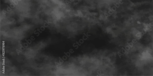 Dark abstract motion of black and white smoke texture on a black background like a stormy night sky with mist and fog