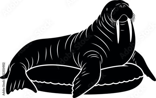 Silhouette walrus resting on ice floe