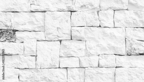 A detailed closeup of a stone wall with a grey bedrock pattern. Natural pattern brick stone wall for wallpaper background.