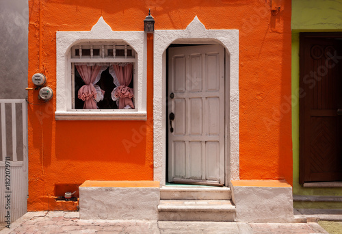 Colorful, brightly painted home in Isla Mujeres, Mexico
