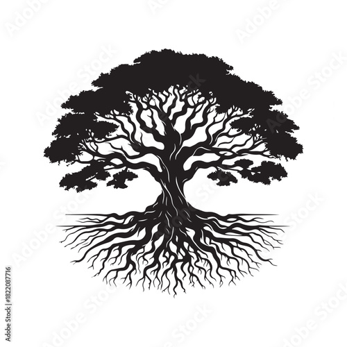 Majestic ancient tree silhouette with sprawling roots symbolizing strength and growth