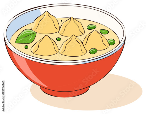 Bowl of dumplings with cream soup and green peas, served in red bowl with shadow.