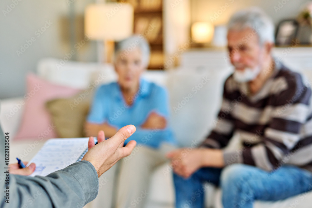 Fototapeta premium Mature couple consultation session with health therapiest or doctor at home or in doctor's office, or an insurance real estate agent