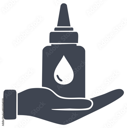 Human hand carefully holding a medical dispenser bottle with a liquid drop symbol