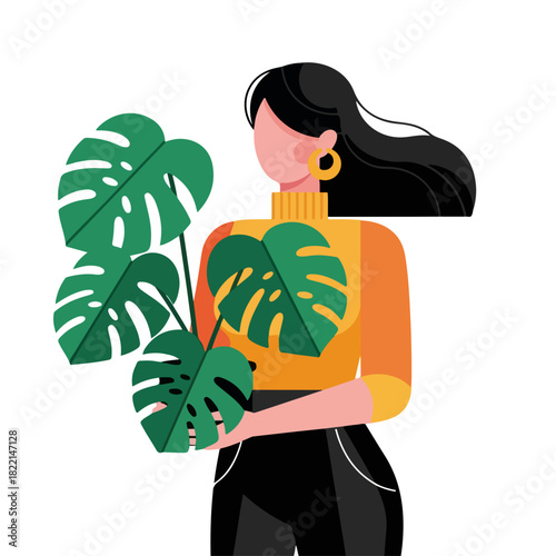Woman with monstera plant holding leafy greens in her arms. Woman with monstera plant taking care of tropical indoor. This woman with monstera plant is perfect for home decor concepts.