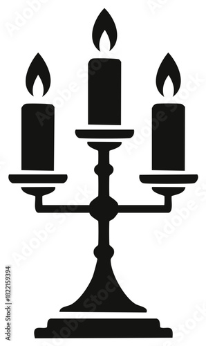 Elegant black silhouette of a three branched candelabra with lit candles