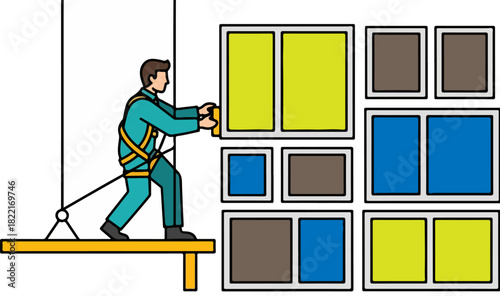 Construction worker installing windows on a building with safety harness at work site