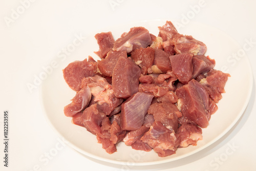 White plate with fresh meat