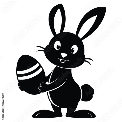 Cartoon black rabbit happily holds a striped easter egg, presenting a simple silhouette