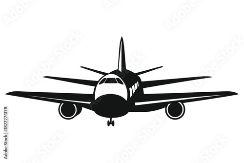Commercial airplane with simple black silhouette is seen front on ready for takeoff