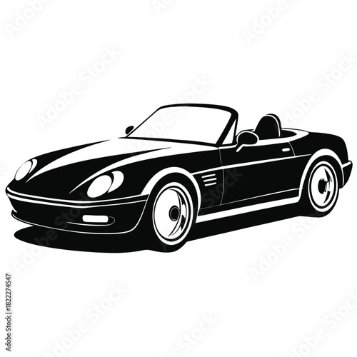 Elegant black convertible car with the top down casts a bold shadow on ground
