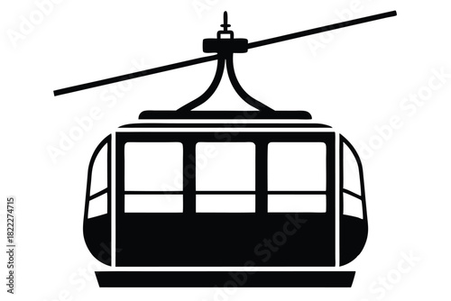 Gondola ski lift ascends using cables providing transport for tourists in this isolated silhouette