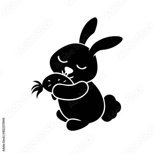 A stylized black silhouette of a rabbit sitting and eating a carrot with its eyes closed in contentment.