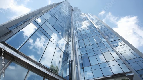 Medium shot focusing on the smooth spotless facade of an office tower using ecofriendly selfcleaning coatings to reduce maintenance and enhance building longevity