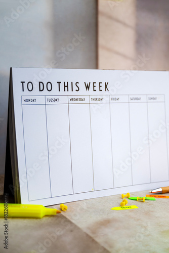To do this week paper planner on shadows background 