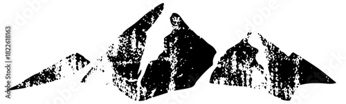 Mountains rise dramatically in a rugged landscape