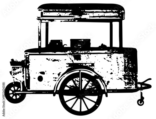 Food cart stands outdoors in a city street