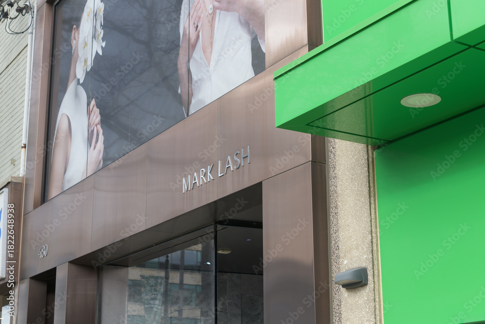 Fototapeta premium exterior building facade and sign of MARK LASH a jeweler, located at 480 Eglinton Av W, Toronto