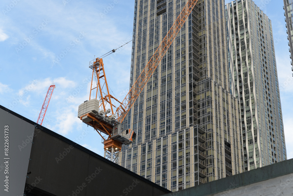 Fototapeta premium construction crane at a development site in Yorkville, Toronto