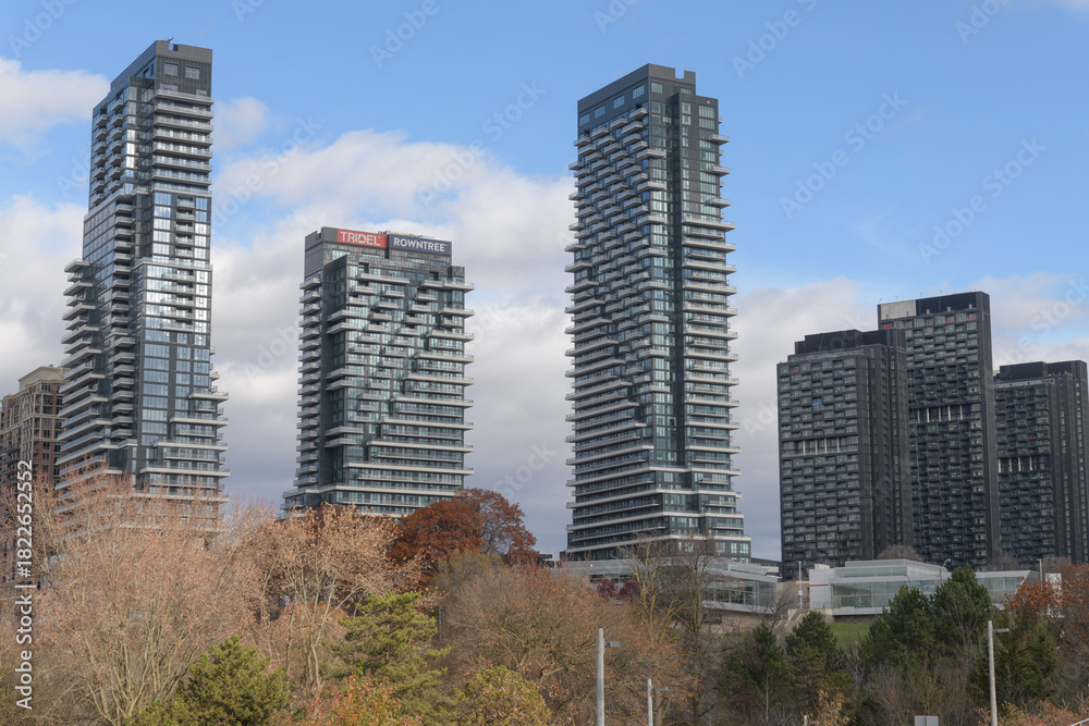 Fototapeta premium wide view of Auberge on the Park Condos and Crosstown Condos located at 30 Inn On The Pk Dr (seen from Eglinton Av E), Toronto