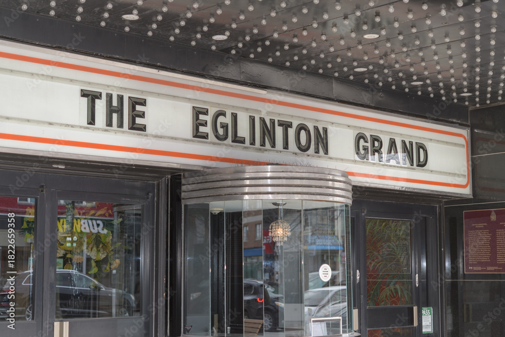 Fototapeta premium entrance and old ticket booth outside The Eglinton Grand, an event venue, located at 400 Eglinton Av W, Toronto