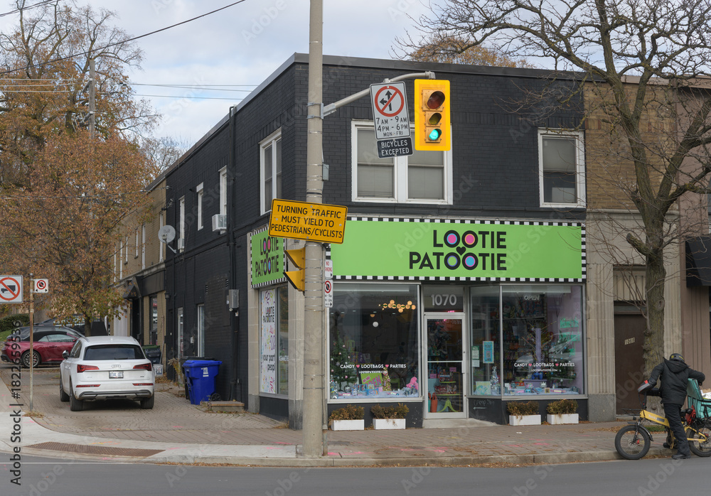 Obraz premium exterior building facade and sign of Lootie Patootie, a party store, located at 1070 Eglinton Av W (at Old Park Rd), Toronto